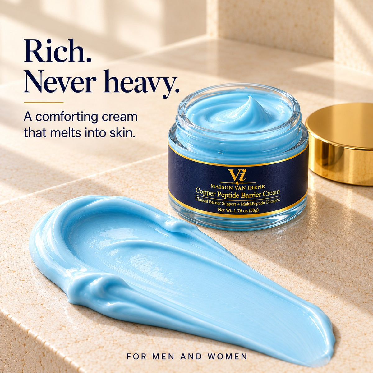 Rich. Never heavy — a smooth swipe of the aqua-blue Copper Peptide Barrier Cream on stone beside the open jar, a comforting cream that melts into skin